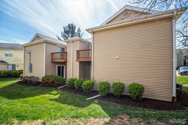 1528 Thrush Ter, Brentwood, MO 63144 - back of house with a yard and a balcony
