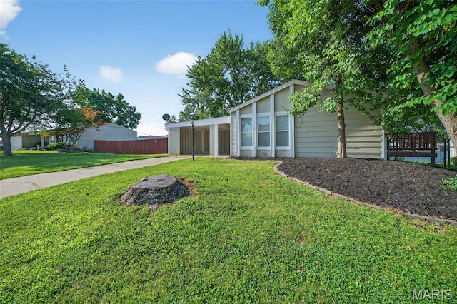 104 Wild Winds Dr, Ofallon, MO 63368 - view of yard featuring concrete driveway and an attached carport