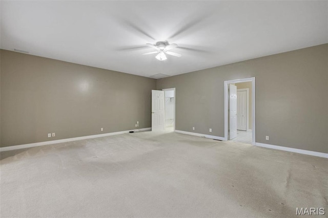 1736 Debra Ln, Arnold, MO 63010 - spare room featuring a ceiling fan, baseboards, and light colored carpet