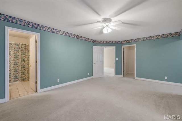 1736 Debra Ln, Arnold, MO 63010 - unfurnished bedroom with carpet, baseboards, ensuite bath, and ceiling fan