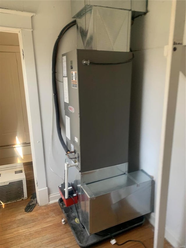 4709 Lewis Pl, Saint Louis, MO 63113 - utility room with heating unit
