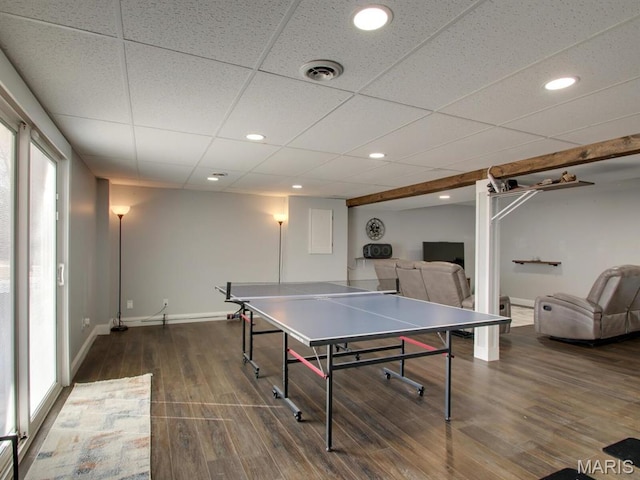 14160 Turkey Run Ct, New London, MO 63459 - recreation room with baseboards, dark wood-type flooring, a drop ceiling, and recessed lighting