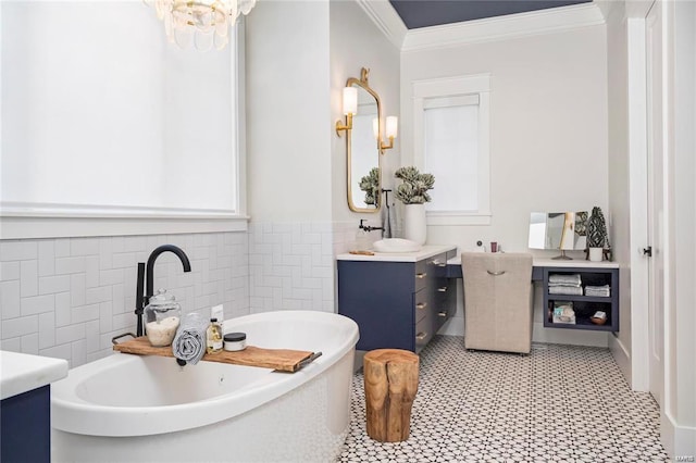 310 Wardenburg Farms Dr, Chesterfield, MO 63005 - full bathroom featuring ornamental molding, a chandelier, a freestanding tub, tile walls, and vanity