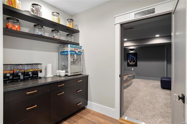 310 Wardenburg Farms Dr, Chesterfield, MO 63005 - bar featuring baseboards and light wood-style floors