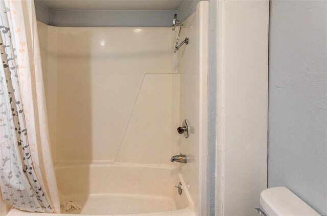 1125 N Market St, Sparta, IL 62286 - bathroom with shower / tub combo and toilet