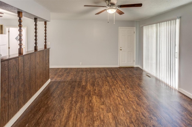 1125 N Market St, Sparta, IL 62286 - unfurnished room with a ceiling fan, wood finished floors, and baseboards