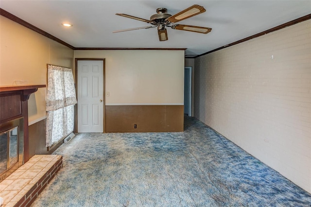 1125 N Market St, Sparta, IL 62286 - unfurnished living room featuring carpet, ornamental molding, and a ceiling fan