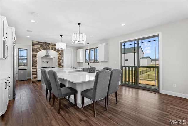 1 Canebrake Ct, Wentzville, MO 63385 - dining room with dark wood-type flooring, recessed lighting, a chandelier, and baseboards