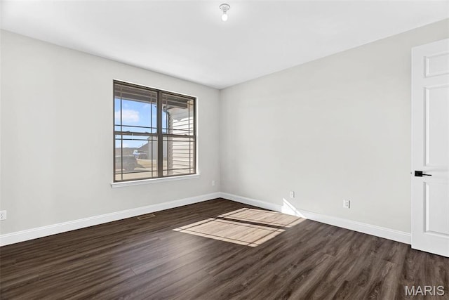 1 Canebrake Ct, Wentzville, MO 63385 - empty room featuring wood finished floors and baseboards