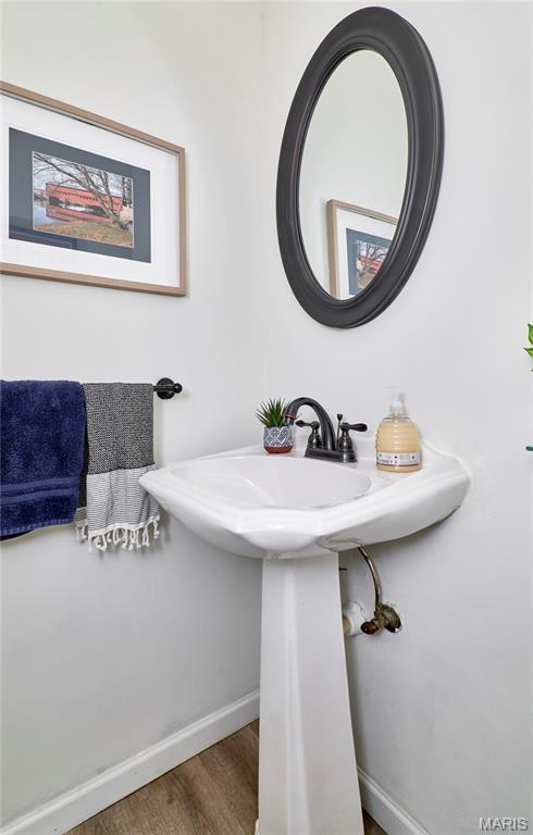 269 Bennington Dr, Troy, MO 63379 - bathroom featuring wood finished floors and baseboards