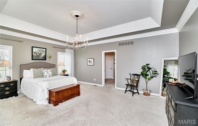 269 Bennington Dr, Troy, MO 63379 - bedroom with a raised ceiling, a chandelier, crown molding, and light colored carpet