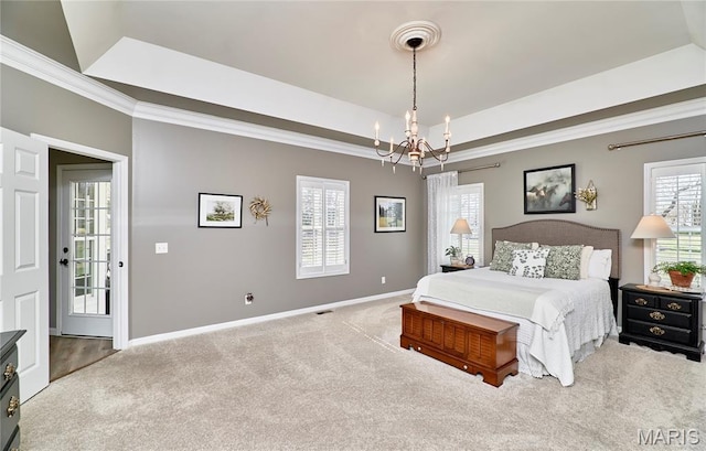 269 Bennington Dr, Troy, MO 63379 - carpeted bedroom with a tray ceiling, a chandelier, and ornamental molding