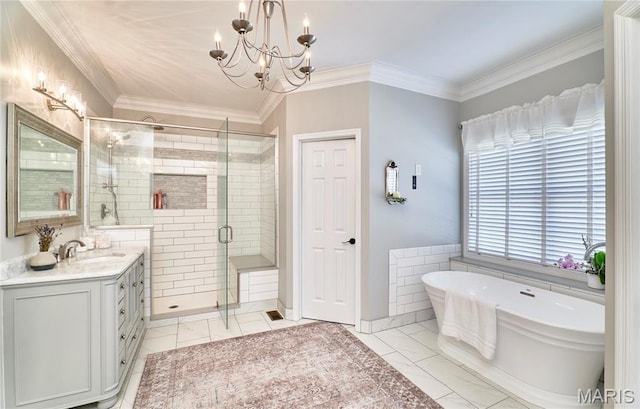 269 Bennington Dr, Troy, MO 63379 - full bath featuring a stall shower, a chandelier, a freestanding bath, vanity, and crown molding