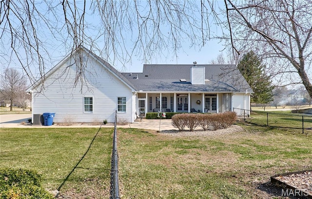 269 Bennington Dr, Troy, MO 63379 - back of house with a patio and a chimney