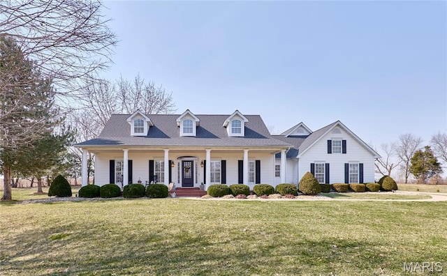 269 Bennington Dr, Troy, MO 63379 - cape cod-style house with a front lawn and covered porch
