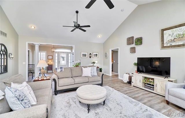 269 Bennington Dr, Troy, MO 63379 - living room with ceiling fan, wood finished floors, high vaulted ceiling, ornate columns, and recessed lighting