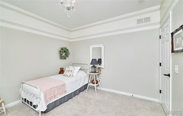 269 Bennington Dr, Troy, MO 63379 - carpeted bedroom featuring a chandelier and baseboards