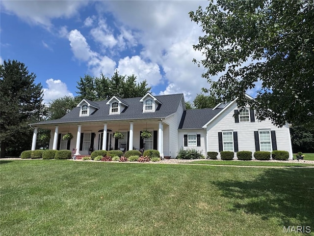 269 Bennington Dr, Troy, MO 63379 - cape cod home featuring a porch, a front yard, and a shingled roof