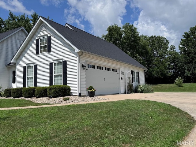 269 Bennington Dr, Troy, MO 63379 - view of front of property with concrete driveway, a front lawn, and a garage