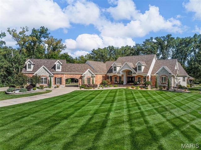 261 US Dr, Wentzville, MO 63385 - view of front of home with a front yard and concrete driveway