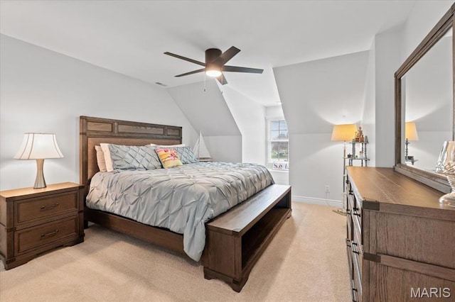 261 US Dr, Wentzville, MO 63385 - bedroom with light colored carpet, vaulted ceiling, baseboards, and a ceiling fan