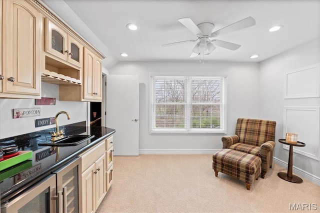 261 US Dr, Wentzville, MO 63385 - kitchen with a sink, light colored carpet, glass insert cabinets, recessed lighting, and wine cooler