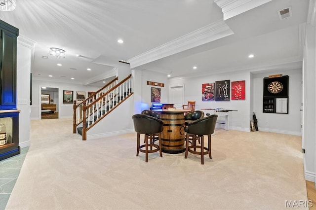 261 US Dr, Wentzville, MO 63385 - dining room with ornamental molding, light carpet, stairs, a dry bar, and recessed lighting