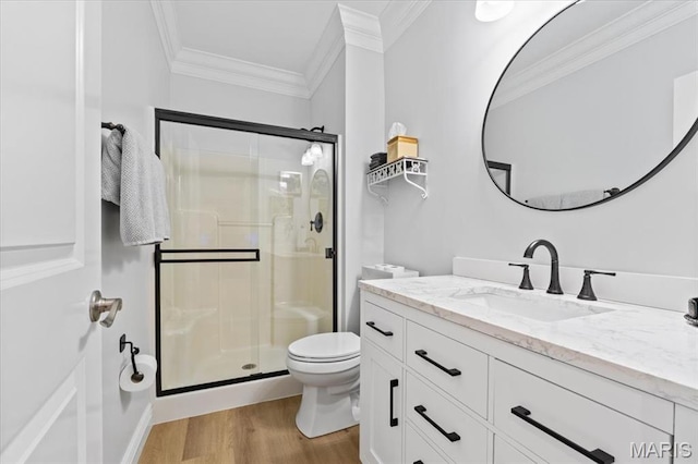 261 US Dr, Wentzville, MO 63385 - bathroom with ornamental molding, wood finished floors, a shower stall, toilet, and vanity