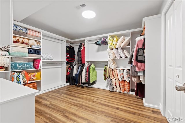 261 US Dr, Wentzville, MO 63385 - spacious closet featuring wood finished floors
