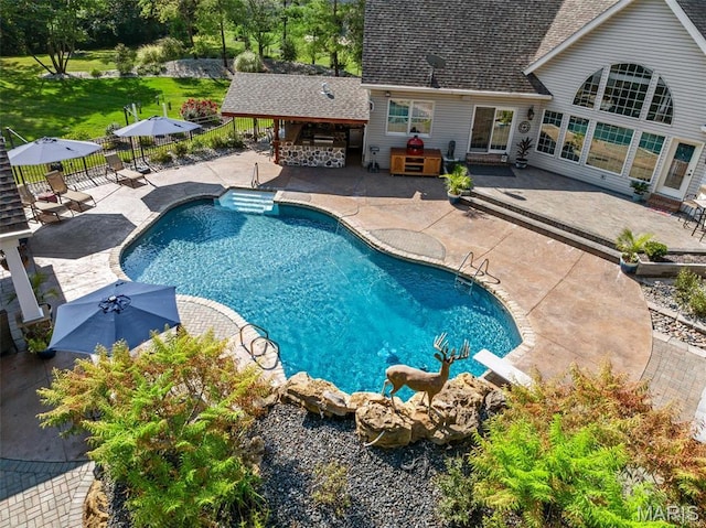 261 US Dr, Wentzville, MO 63385 - view of swimming pool featuring fence and a patio