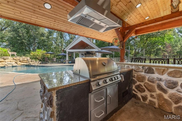 261 US Dr, Wentzville, MO 63385 - view of patio / terrace featuring grilling area, area for grilling, an outdoor pool, and fence