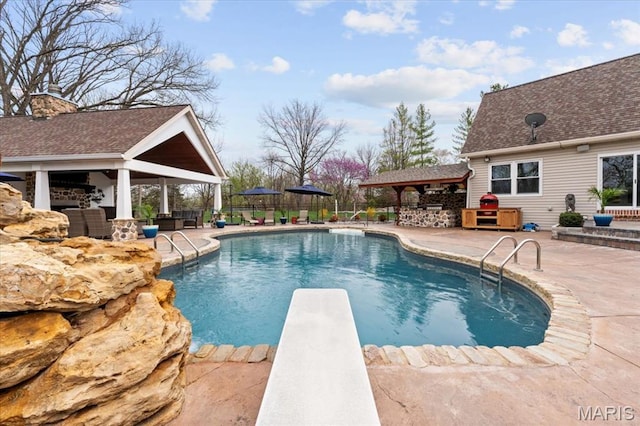 261 US Dr, Wentzville, MO 63385 - view of pool featuring a gazebo, a patio, fence, and a diving board
