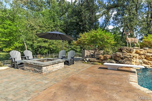 261 US Dr, Wentzville, MO 63385 - view of patio / terrace featuring a fire pit