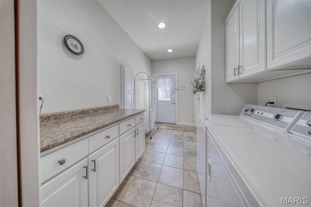 17205 Elk Prairie Dr, Rolla, MO 65401 - laundry room with washer and dryer, cabinet space, light tile patterned floors, and recessed lighting