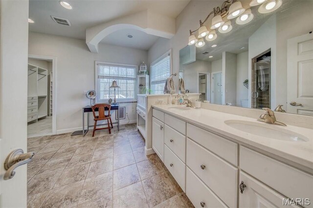 17205 Elk Prairie Dr, Rolla, MO 65401 - bathroom with double vanity and baseboards