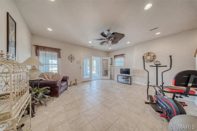 17205 Elk Prairie Dr, Rolla, MO 65401 - workout room featuring healthy amount of natural light, a ceiling fan, recessed lighting, light tile patterned flooring, and baseboards