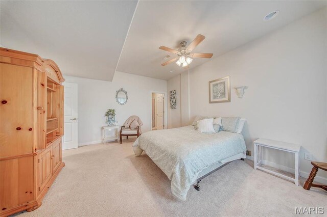 17205 Elk Prairie Dr, Rolla, MO 65401 - bedroom with light carpet, baseboards, and a ceiling fan