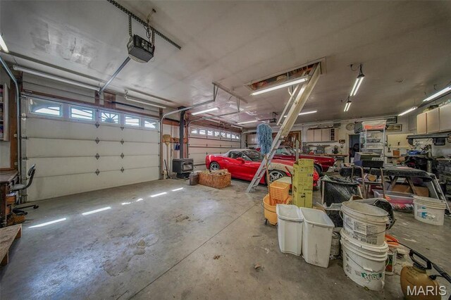 17205 Elk Prairie Dr, Rolla, MO 65401 - garage featuring a garage door opener
