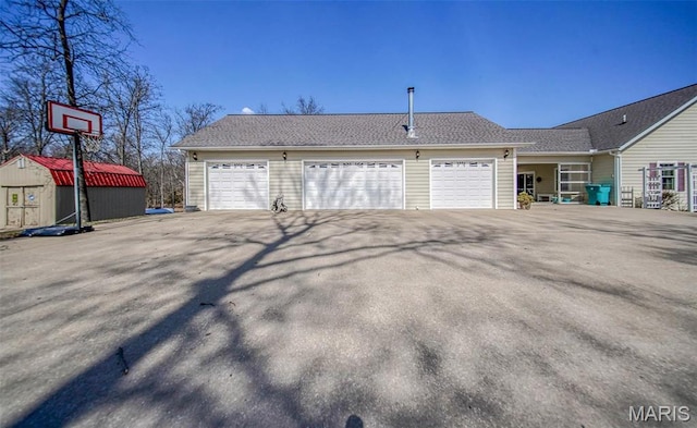 17205 Elk Prairie Dr, Rolla, MO 65401 - view of side of property with an outdoor structure and a storage unit