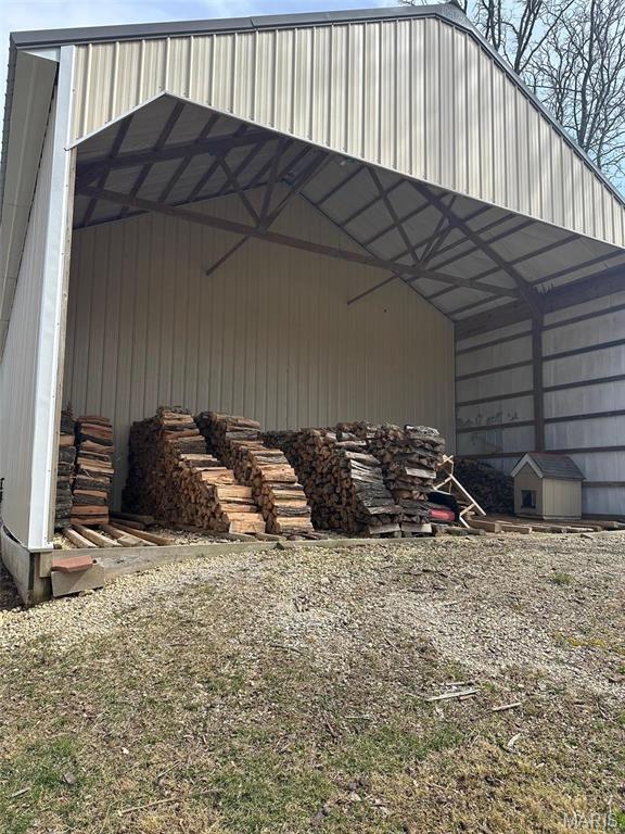 17205 Elk Prairie Dr, Rolla, MO 65401 - view of parking / parking lot with a pole building