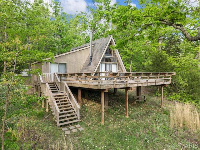 372 Alpine Lake Dr, Wright City, MO 63390 - rear view of property featuring a deck, stairs, and roof with shingles