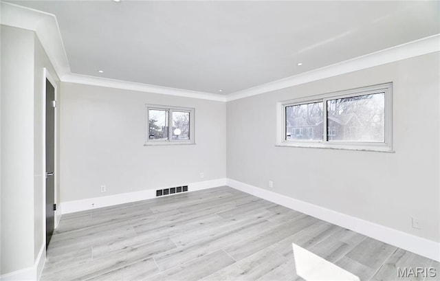 601 Brotherton Ln, Saint Louis, MO 63135 - empty room featuring ornamental molding, wood finished floors, baseboards, and recessed lighting