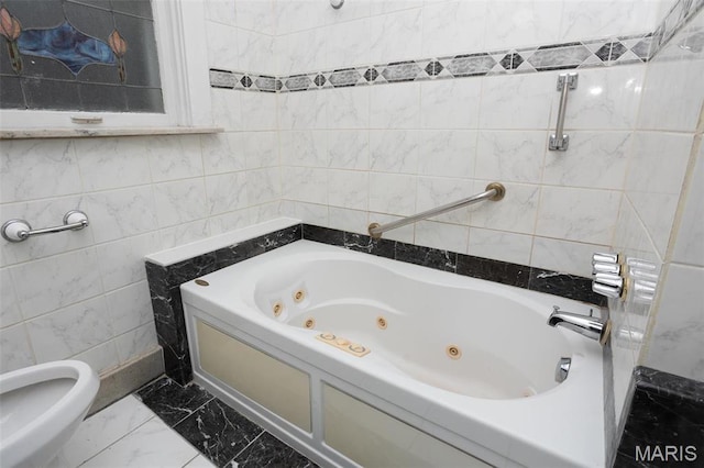 3092 Bellerive Dr, Saint Louis, MO 63121 - bathroom featuring a jetted tub, marble finish floors, and tile walls