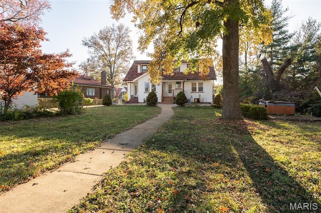 3092 Bellerive Dr, Saint Louis, MO 63121 - bungalow-style home with a hot tub and a front yard