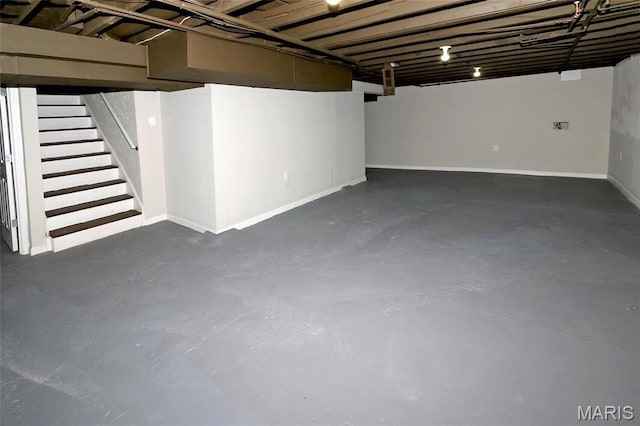 3092 Bellerive Dr, Saint Louis, MO 63121 - finished basement featuring stairs and baseboards