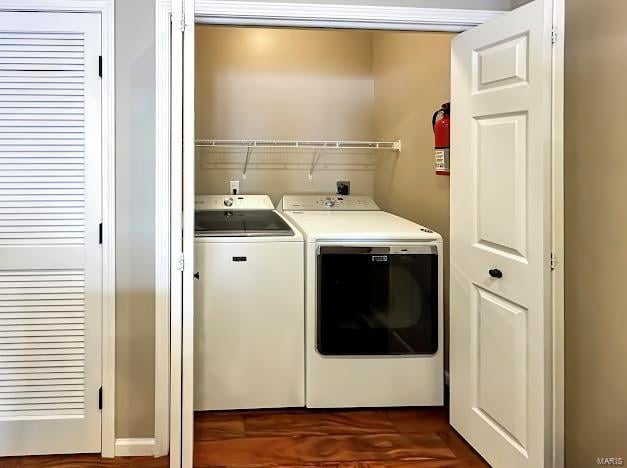washroom with washing machine and dryer