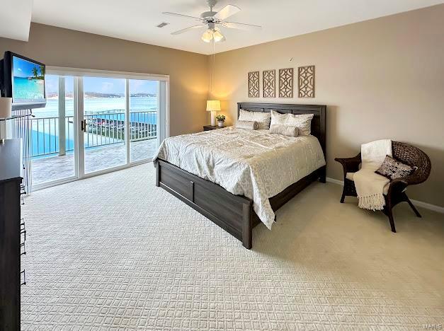 bedroom with carpet flooring, access to exterior, baseboards, and a ceiling fan