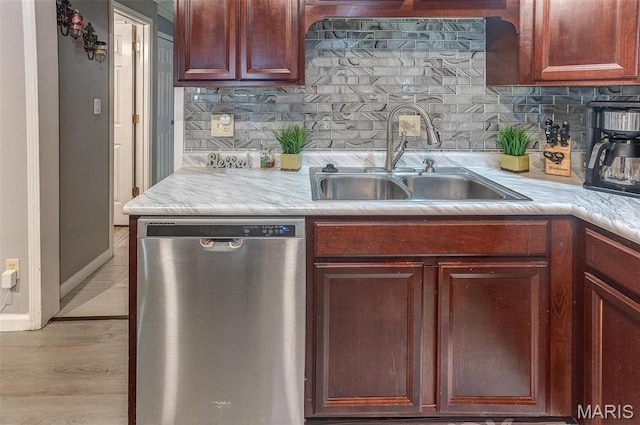 424 N College St, Centralia, IL 62801 - kitchen with stainless steel dishwasher, light countertops, and tasteful backsplash