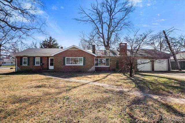 7304 Northern Dr, Belleville, IL 62223 - single story home with brick siding, a chimney, and a front yard