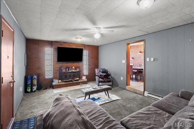 7304 Northern Dr, Belleville, IL 62223 - carpeted living area featuring ceiling fan, a baseboard radiator, and brick wall
